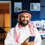 a man holding a phone